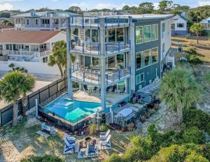 an aerial view of a house with a swimming pool at Ocean View Modern in Tybee Island