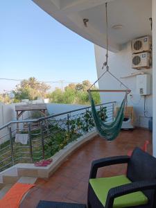 En balkon eller terrasse på Hergla Apartment