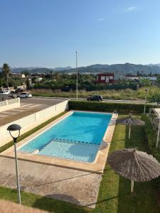 Swimmingpoolen hos eller tæt på Oliva Sol Apartment