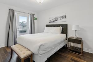 Postel nebo postele na pokoji v ubytování Family Townhome in Historic Snowbridge + 43 fotografií