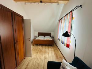 Una cama o camas en una habitación de Ma-inz.eu