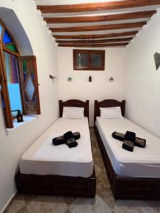 Ένα ή περισσότερα κρεβάτια σε δωμάτιο στο Dar Lala Mnana local Heart of Chaouen