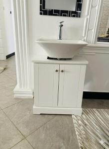 Koupelna v ubytování Ramza APARTMENTS