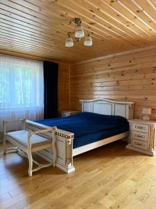 Postel nebo postele na pokoji v ubytování 10 km - Sweet Home