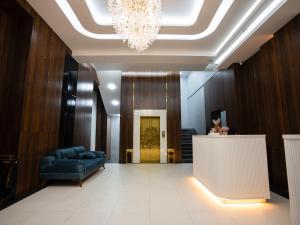 Ruang duduk di Aman Hotel&Spa Free Airport shuttle service by Avant group
