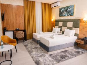 Katil atau katil-katil dalam bilik di Aman Hotel&Spa Free Airport shuttle service by Avant group +27 gambar