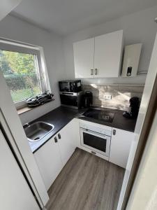 Η κουζίνα ή μικρή κουζίνα στο schönes Apartment in Langenfeld