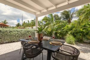 Un jardín fuera de Pal'i Koko, modern appartement 5 min vanaf Mambo