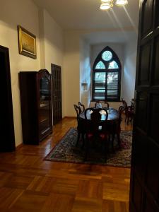 a dining room with a table and chairs and a window at Nostra Cultura Zamek Bierzgłowski in Zamek Bierzgłowski +37 photos
