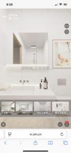 a white bathroom with a sink and a mirror at Wings apartman Kittima in Amphoe Koh Samui