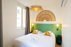 Postel nebo postele na pokoji v ubytování Le Chenavard III-coeur Lyon-Central air conditioning