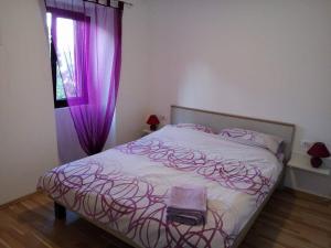 Postel nebo postele na pokoji v ubytování Apartments & Room Toni