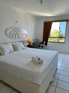 Ένα ή περισσότερα κρεβάτια σε δωμάτιο στο Inn Tribus Hotel +90 φωτογραφίες
