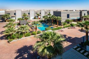 Bazén v ubytování منتجع رينيوم القيروان الرياض nebo v jeho okolí