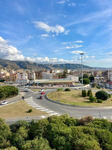 a winding road in a city with buildings at B&B Penthouse in Gallico
