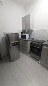 Nhà bếp/bếp nhỏ tại Exclusive Muscat Homes