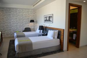 Posezení v ubytování Warwick Stone 55 Hotel Beirut