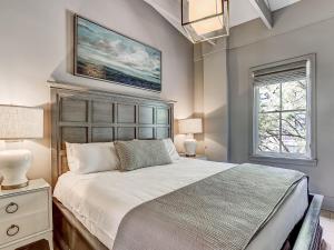 a bedroom with a large bed and a window at Parker's Collection - 6 Bedroom in Savannah +38 photos