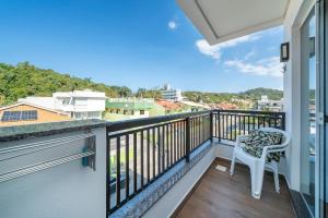 Μπαλκόνι ή βεράντα στο Flat em Residencial - Entre Bombinhas e 4 Ilhas
