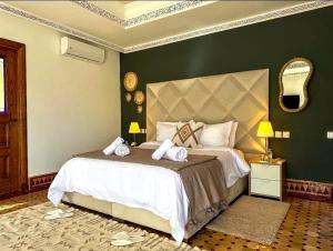 Postel nebo postele na pokoji v ubytování Complexe villa and Restaurant