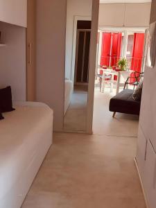 a room with a bed and a living room at La Casina Delle Olghe 1 in Cavriana +16 photos