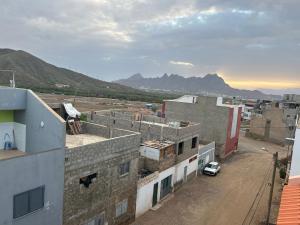 a view of a city with mountains in the background at CasaTanha in Mindelo