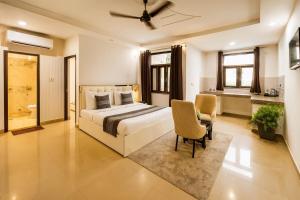 Gallery image of Holiday In , Vrindavan #Big Swimming Pool #luxury Rooms # Lush Garden # Family Friendly # Kids Play Zone # Calm & Spiritual Vibes # Away From City Hustle# By elegance group# in Vrindāvan