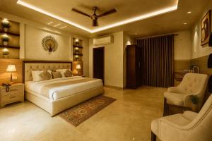 Gallery image of Holiday In , Vrindavan #Big Swimming Pool #luxury Rooms # Lush Garden # Family Friendly # Kids Play Zone # Calm & Spiritual Vibes # Away From City Hustle# By elegance group# in Vrindāvan