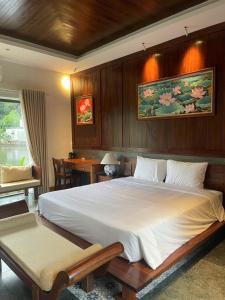 Ένα ή περισσότερα κρεβάτια σε δωμάτιο στο The Garden Lodge