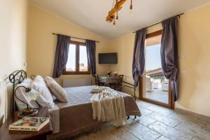 Un pat sau paturi într-o cameră la Villa Maila