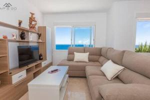 Μια τηλεόραση ή/και κέντρο ψυχαγωγίας στο Blue Villa Rest & Pool