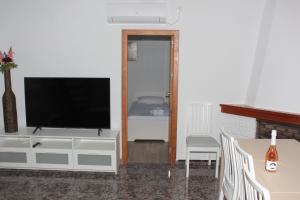 TV a/nebo společenská místnost v ubytování La Casa de la Cala del Moral