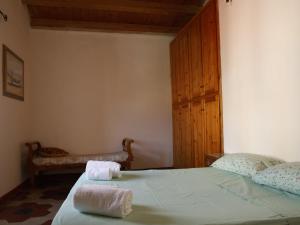 Postel nebo postele na pokoji v ubytování tiny house