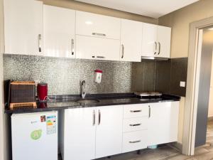 Kuchyň nebo kuchyňský kout v ubytování Bone Apart + 4 fotografie