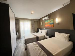 Postel nebo postele na pokoji v ubytování Bone Apart