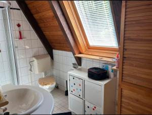 Afbeelding uit fotogalerij van Häuschen zwischen Wald und Balksee in Wingst