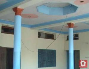 a room with two blue columns and a ceiling at Ibrahim flats Mardan in Mardan