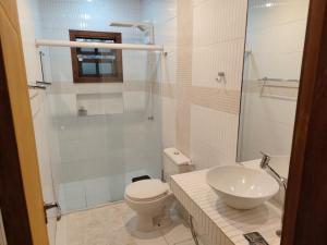 Koupelna v ubytování Suites na Casa das Conchas