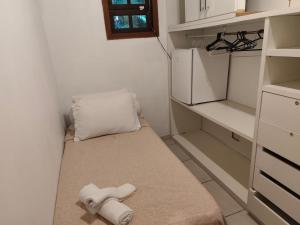 Postel nebo postele na pokoji v ubytování Suites na Casa das Conchas