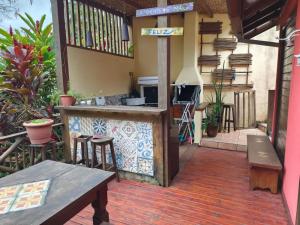 Kuchyň nebo kuchyňský kout v ubytování Suites na Casa das Conchas