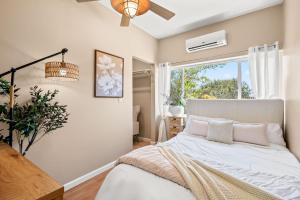 a bedroom with a bed and a window at Tranquil Quiet Mountain Home w Private Garden in Chino Hills