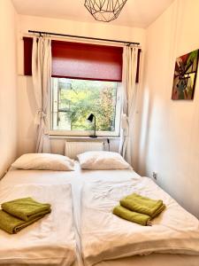 En eller flere senge i et værelse på Familly Apartament 5 + 1 billede