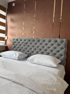 Ένα ή περισσότερα κρεβάτια σε δωμάτιο στο Relax Apartment with sauna and jacuzzi in city center