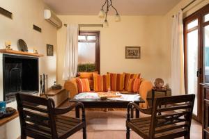 Χώρος καθιστικού στο Odysseus Villa +9 φωτογραφίες