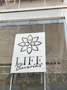 a sign on the side of a building that says lifebreakers at Life Bucerías, Modern Studio Near the Beach in Bucerías