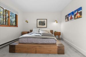 Ένα ή περισσότερα κρεβάτια σε δωμάτιο στο RMR: Yarrow 2311 Condo in The AspensWilson WY