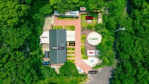 an overhead view of a building in a forest at Yura Green - Vacation STAY 65841v in Yura +3 photos
