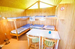 En eller flere køyesenger på et rom på Nysted Strand Camping & Cottages