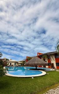 Bazén v ubytování Village Conchas e Corais nebo v jeho okolí