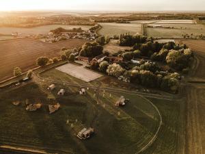 an aerial view of a farm with cows at The Granary Estates 
